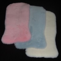 baby blue, Baby pink and white shaped Cozifleece - Lambskin for pushchairs